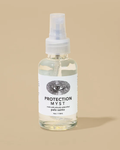 Palo Santo Protection Mist in a nude background