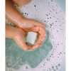 Splashing Bath Bombs Soap on a hands