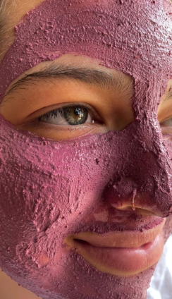 A girl with Rose Face Mask on her face