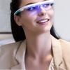 A girl wearing her Lighttherapy Glasses