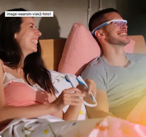 A couple wearing their Lighttherapy Glasses