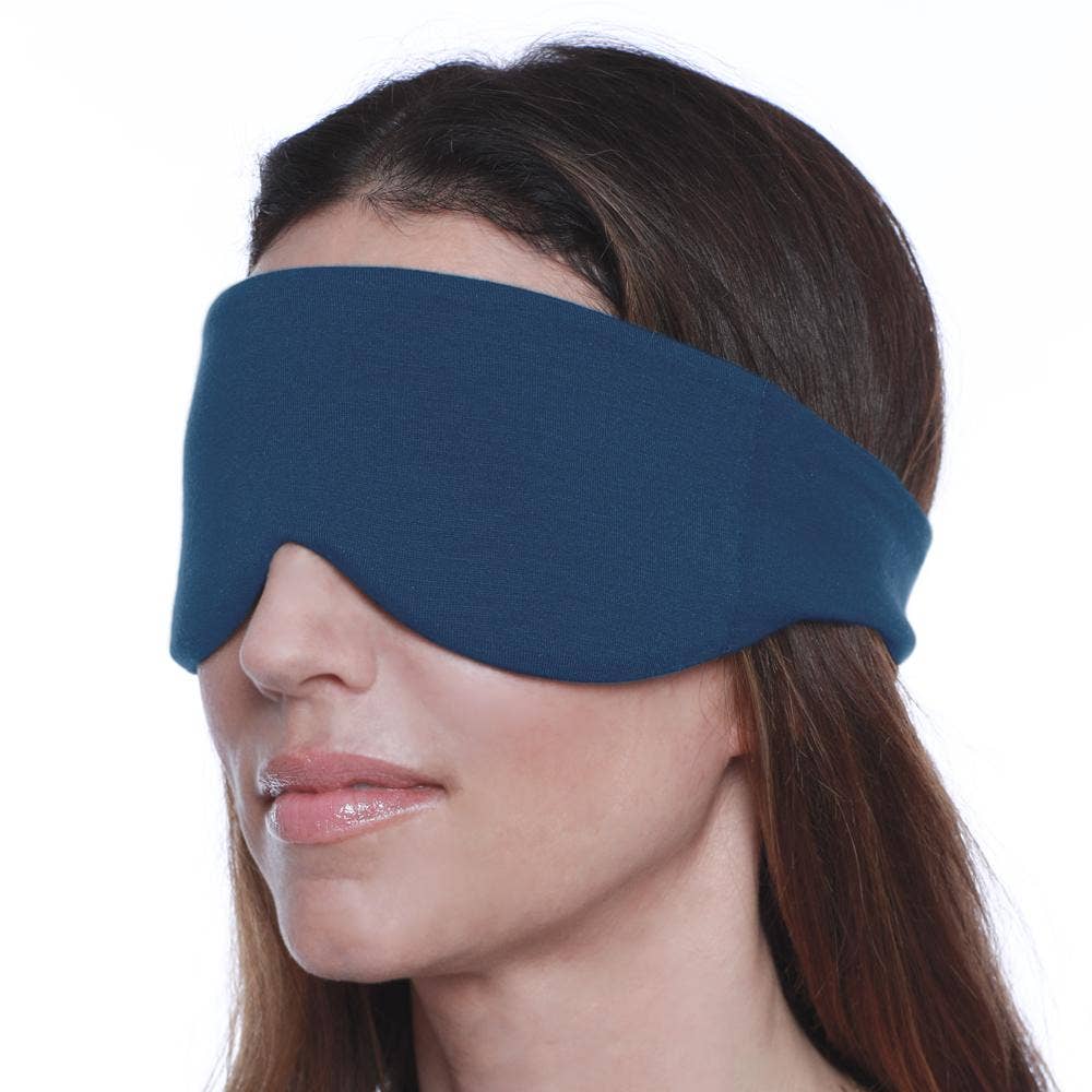 A girl worn her navyblue sleep mask